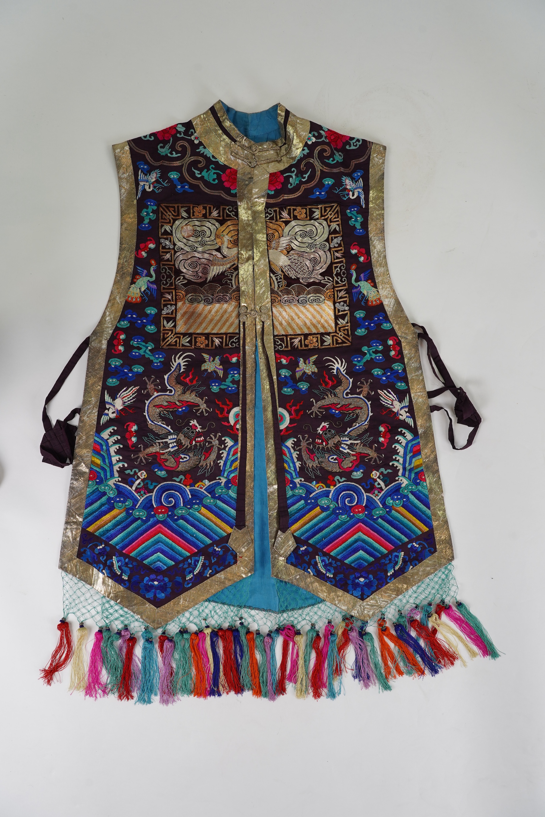 A Chinese embroidered silk vest, xiapei, early 20th century